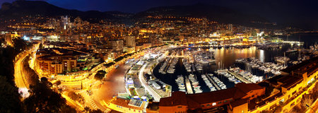 MONTE CARLO, MONACO - JANUARY 19: Hercules harbour night panorama in Monte Carlo on JANUARY 19, 2012. Night photo of Hercules harbour and La Condamine panorama in Monte Carlo, Monaco.のeditorial素材