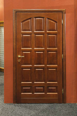 Old style brown wood entrance door