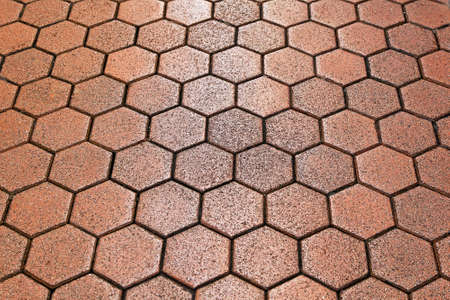 Old hexagon pattern terracotta tiles background texture