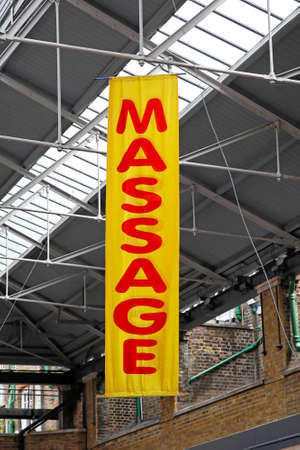 Masssage banner cloth hanging from hall roofの写真素材