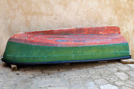 Small boat shell up side down in storage positionの写真素材