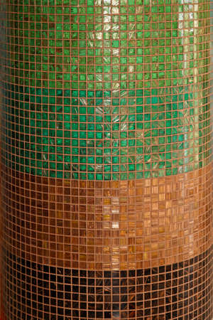 Close up shot of column with mosaic tilesの写真素材