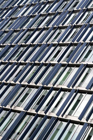 Modern office building with blue fins patternの写真素材