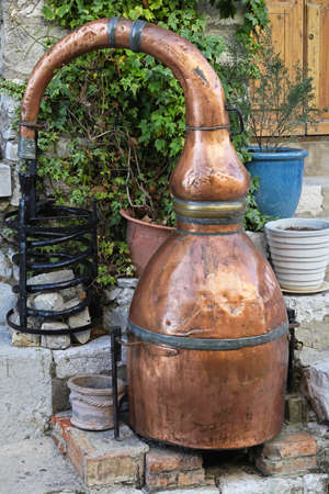 Medieval distiller made from copper for brandyの写真素材