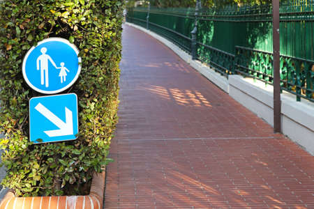 Segregated pedestrian path sidewalk with bricksの写真素材