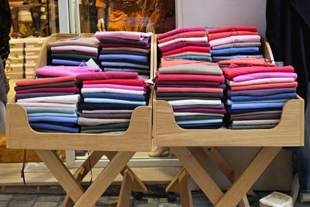 Small stall with colorful jumpers and sweaters