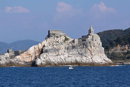 Saint Peter church at Ligurian coast rockの写真素材