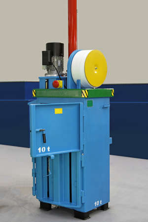 Hydraulic baling press machine for compacting plastic wasteの写真素材
