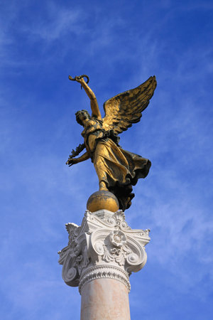 ROME, ITALY - OCTOBER 25: Winged Victory statue in Rome on OCTOBER 25, 2009. Victorian Winged Victory holding palm and snake sculpture in Rome, Italyのeditorial素材