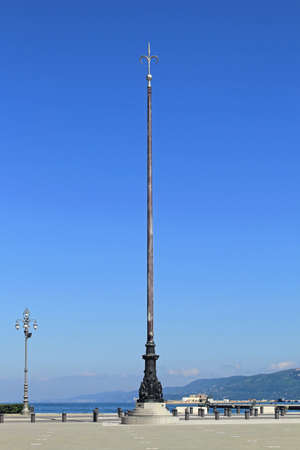 Bronze flag pole in Trieste harbor Italyの写真素材