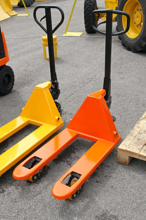 Two pump trucks pallet jacks for warehouseの写真素材