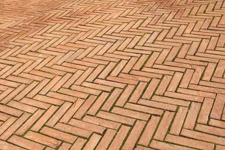 Traditional terracotta brick pavement in Rome