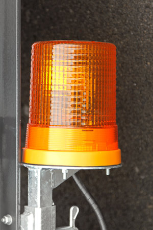 Amber warning flashing light beacon at trailer