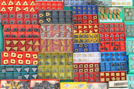 Cemented carbide cutting tools in plastic boxes