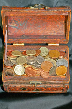 Pounds and pennies saving in the chest