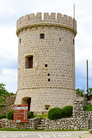 CRES, CROATIA - MAY 17  Cres castle tower on MAY 17, 2010  Medieval castle tower at sunny day in Cres island, Croatia のeditorial素材