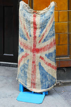Grunge style Union Jack British flag made from old sackの写真素材