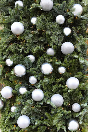 Christmas tree with silver bauble ornamentsの写真素材