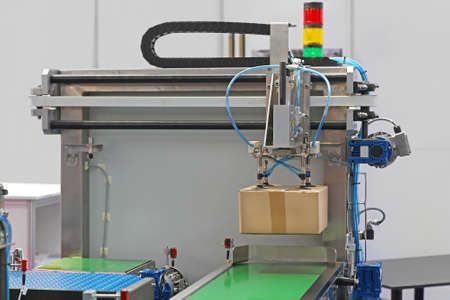Handling packages at automated line in distribution warehouse