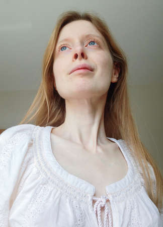 Young blonde woman with blue eyes