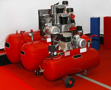 Three air compressors for auto service garageの写真素材