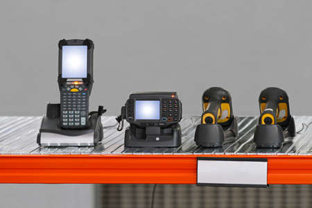 Handheld barcode scanner in distriburtion center warehouse