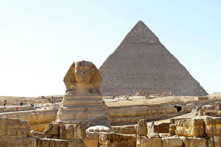 GIZA, EGYPT - FEBRUARY 27  A Sphinx in Giza on FEBRUARY 25, 2010  The Great Sphinx with the Pyramid of Khufu in Giza, Egypt のeditorial素材