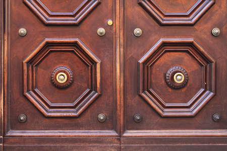 Luxury wooden door with brass details