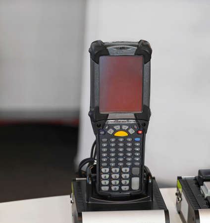 Handheld barcode scanner computer in distribution warehouseの写真素材