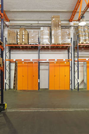 Lockers and storage shelves in distribution warehouse