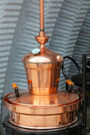 Copper still apparatus for distilling alcoholの写真素材