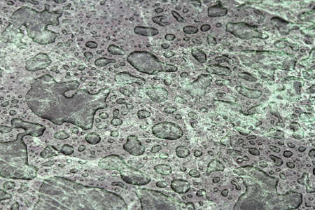 Wet surface of green marble with water dropsの写真素材