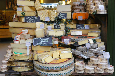 LONDON, UNITED KINGDOM - NOVEMBER 20: Cheese shop in London on NOVEMBER 20, 2013. A variety of...