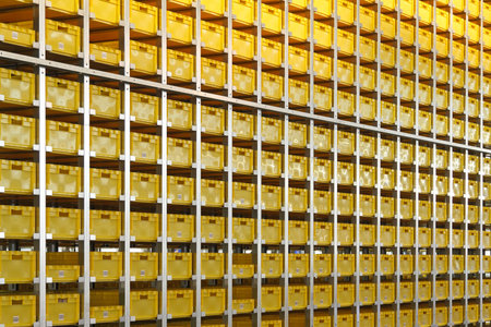 Yellow plastic crates in distribution warehouseの写真素材