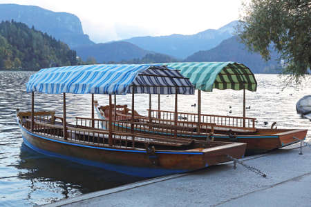 Two tourist boats at Lake Bled in Sloveniaの写真素材