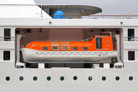 Enclosed lifeboat on a big cruise ship