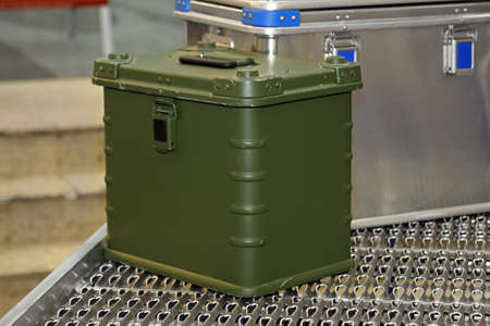Green box with survival gear equipment
