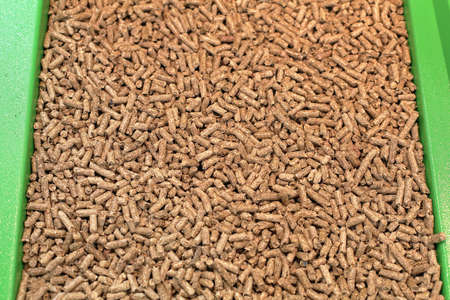 Wood pellet heating fuel made from compressed biomass