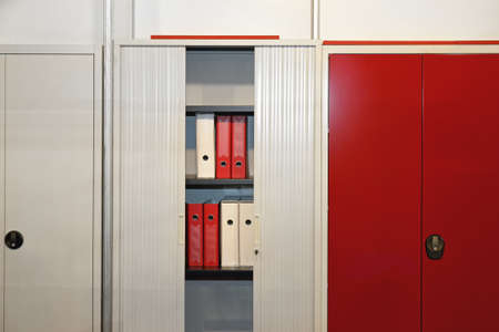 Ring binders and documents in office cabinetsの写真素材