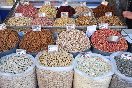 Various Nuts in Bulk Sacks at Farmers Marketの写真素材