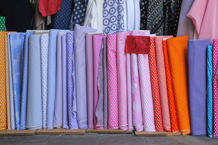 Colorful Textile Fabric Rolls in Material Shopの写真素材