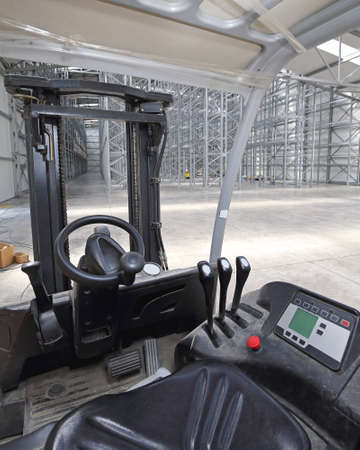 Forklift Cabin View With Controls in Warehouseの写真素材