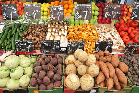 Vegetables and Fruits in Crates at Farmers Marketの写真素材