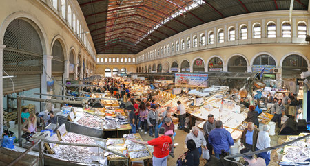 ATHENS, GREECE - MAY 05: Fish Market in Athens on MAY 05, 2015. Seafood Stalls with Fishmongers and Shoppers in Central Market in Athens, Greece.のeditorial素材