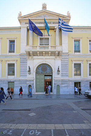 ATHENS, GREECE - MAY 04: National Bank of Greece in Athens on MAY 04, 2015. People in Front of National Bank of Greece Headquaters Building in Athens, Greece.のeditorial素材