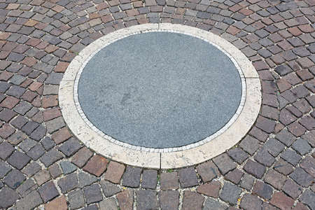 Circle Decoration in Cobblestone Paved Street