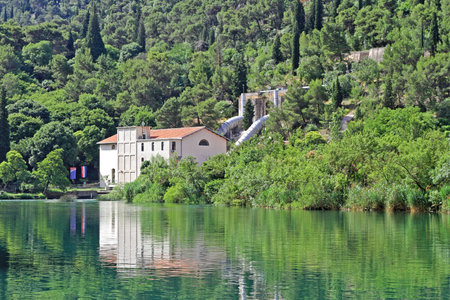 SKRADIN, CROATIA - JUNE 15: Jaruga Hydroelectric Power Plant on JUNE 15, 2010. Oldest Hydro Power Plant in Europe Jaruga at Krka River in Skradin, Croatia.のeditorial素材