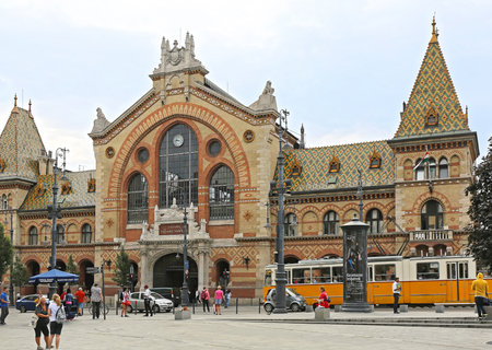 BUDAPEST, HUNGARY - JULY 13: Shoppers in Front of Central Market Hall in Budapest on JULY 13, 2015. Great Market Hall at Fovam Square With People and Traffic in Budapest, Hungary.のeditorial素材