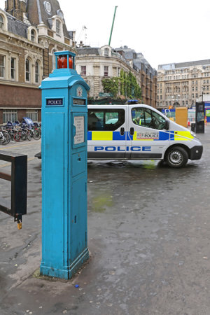 LONDON, UNITED KINGDOM - NOVEMBER 24: Police Telephone Post in London on NOVEMBER 24, 2013. Retro Style Police Phone Post in London, United Kingdom.のeditorial素材