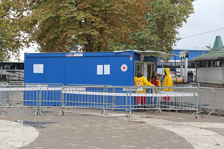 BELGRADE, SERBIA - SEPTEMBER 30, 2015: Humanitarian Aid Workers at Red Cross Help Point For Syrian...